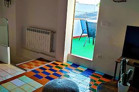 Casa Luzon, terraza-solarium con ducha y salon rustico